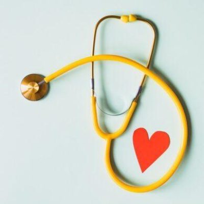 yellow stethoscope with a heart